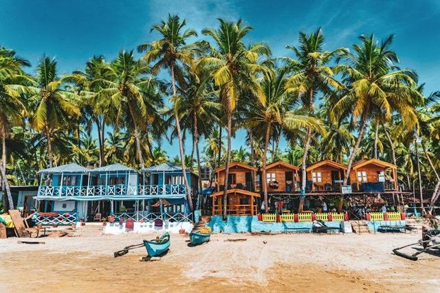 Beach huts and palms in Goa
