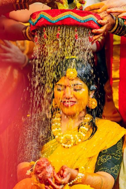 Haldi ceremony with turmeric and flowers